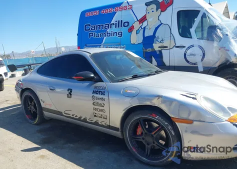 1999 Porsche 911 Carrera/Carrera 4/Carrera Tiptronic z USA, uszkodzony, nr VIN WP0AA2993XS621097